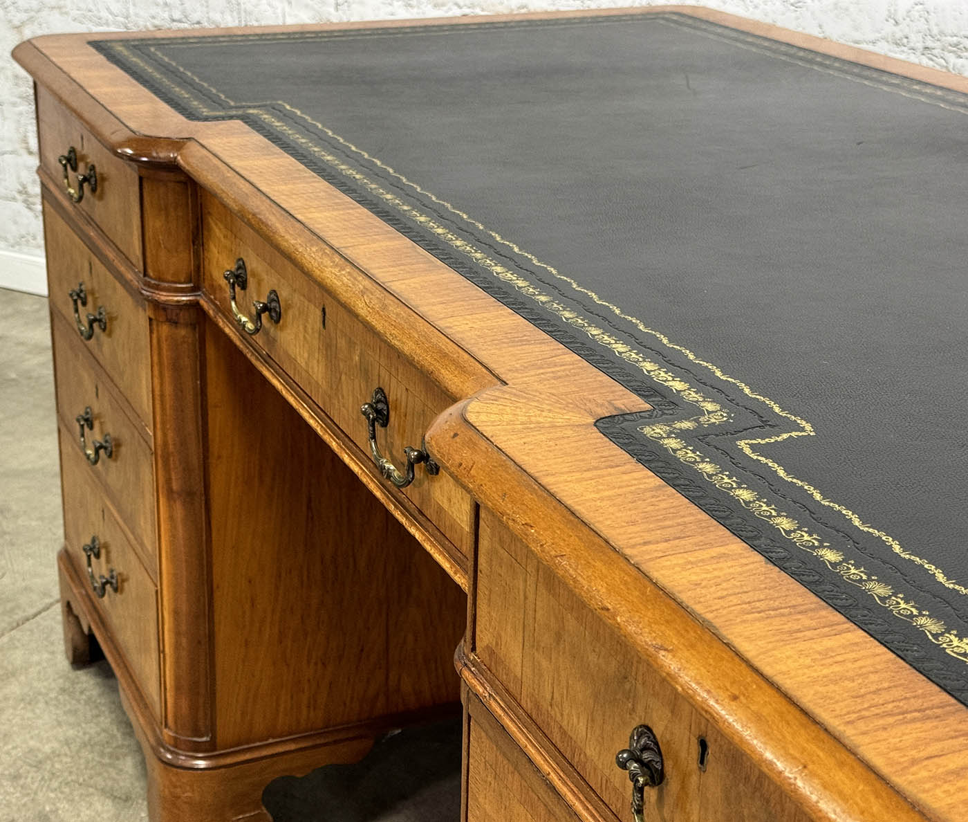 Antique Nine Drawer Birds-Eye Maple Desk with Leather Inlay